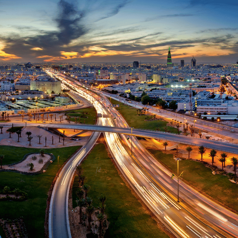 Busy roads of Saudi Arabia, with lighting vehicles.